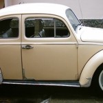 Foto do carro antigo Volkswagen Fusca ano 1965 cor bege